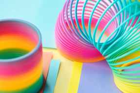 two multicolored slinky toys